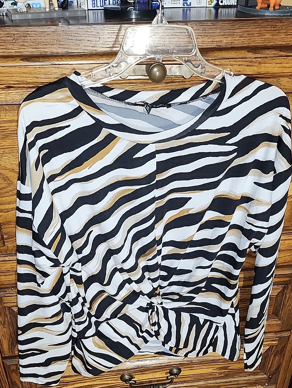 Zebra-Print Long Sleeve Knot Front Top — Black, White & Tan